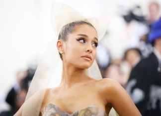 Ariana Grande Stalks Penn Badgley in “The Boy is Mine” Music Video