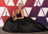 Lady Gaga with her Oscar award for best original song