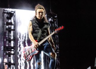 The Cure’s Simon Gallup Forced to Miss a Show, Replaced By His Son